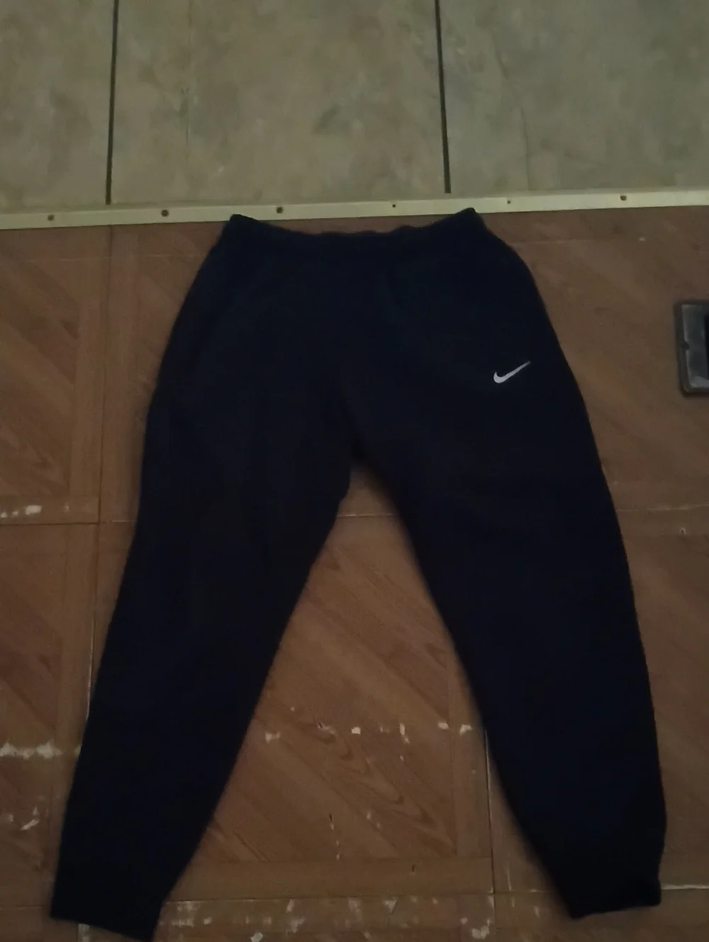 Nike Black Joggers with White Swoosh